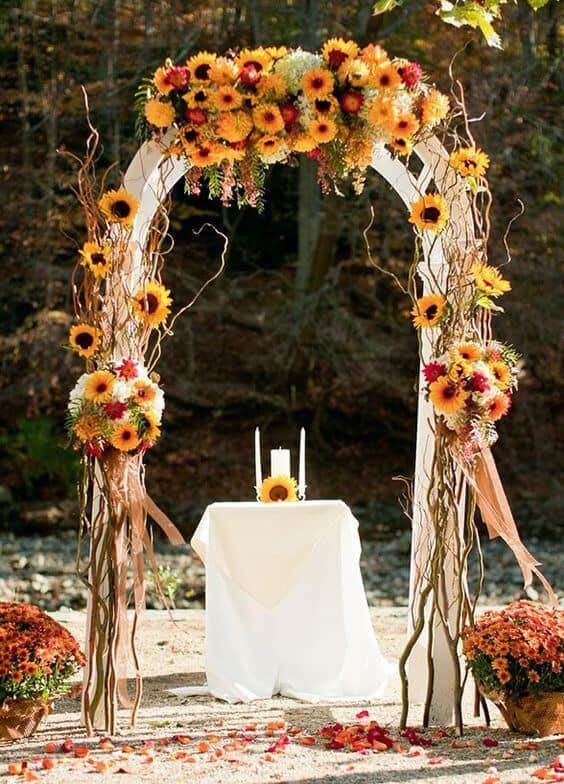 Imagine yourself going down the aisle following a trace of dried flowers to a splendid flower arch carrying the most stunning bouquet of autumn wedding flowers! For more ideas got to wedwithbliss.com